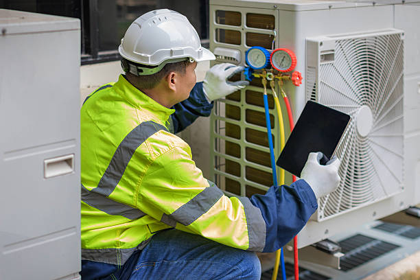 Professional Air Duct Cleaning technician working in Belknap, IL